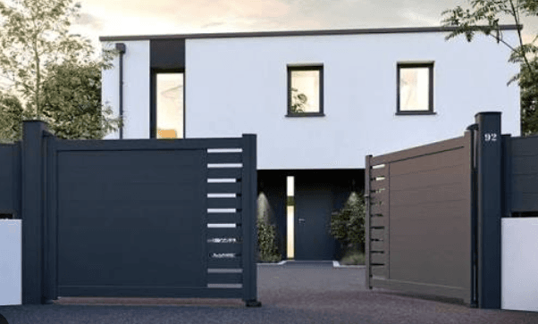 Illuminated villa entrance at dusk